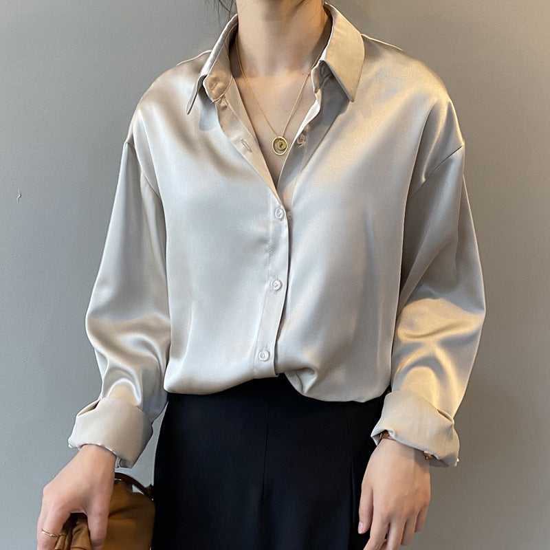 Women’s office wear satin silk shirt in vintage style with long sleeves.