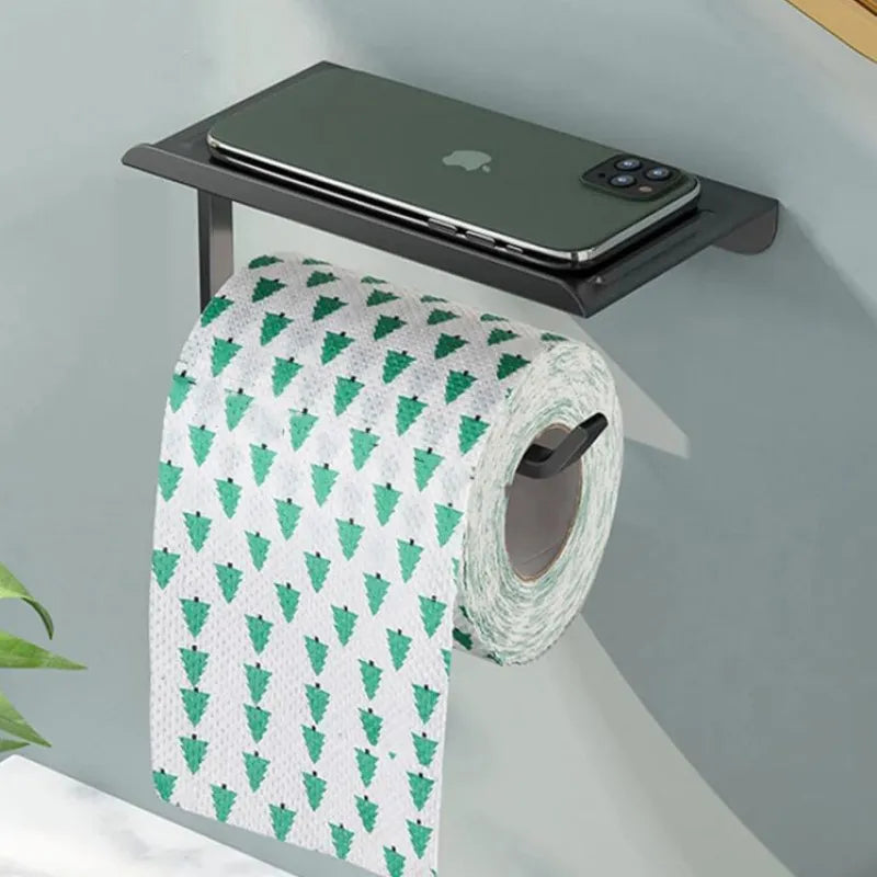 Black aluminum toilet paper holder with phone shelf, wall-mounted.