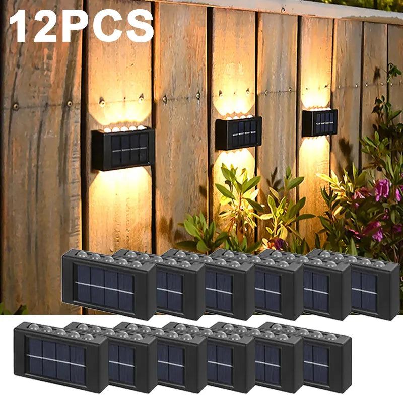 Outdoor waterproof LED solar wall lamps on wooden fence illuminating garden, perfect for pathways and balconies.