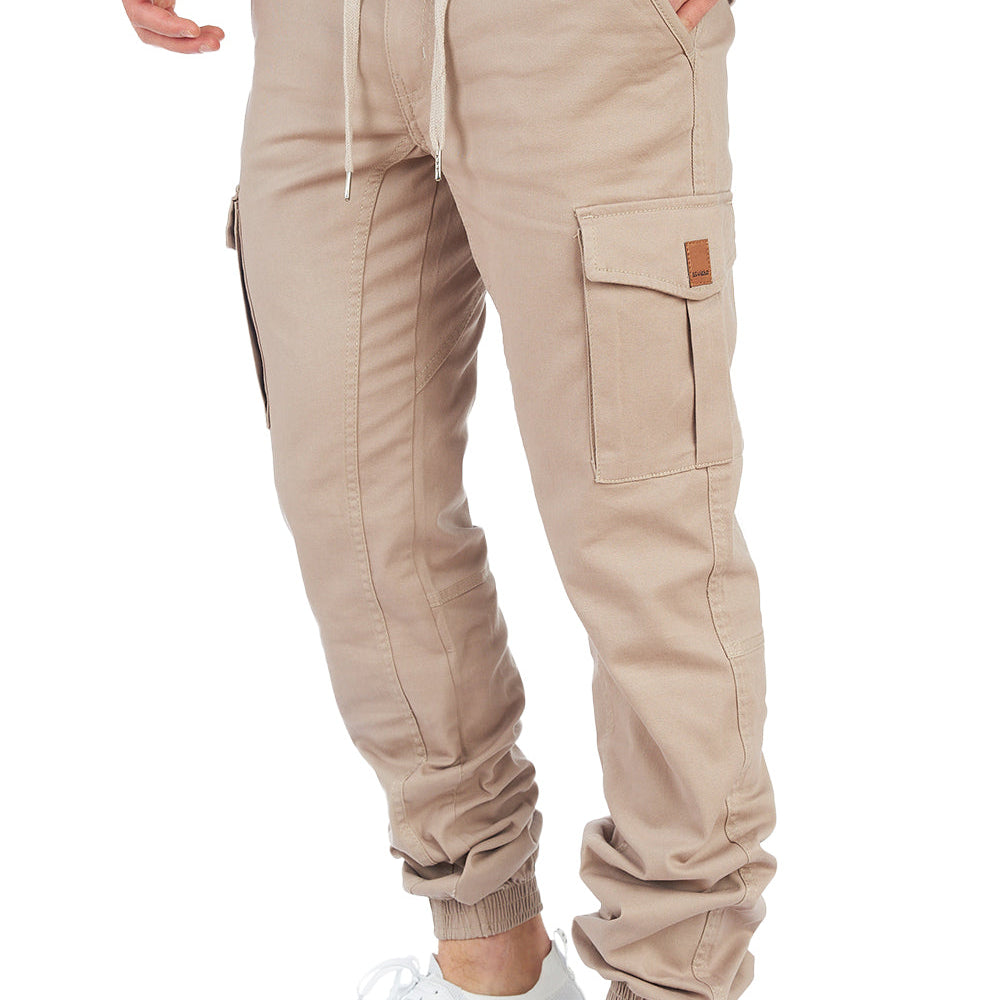 Men's cargo work trousers, fleece-lined, multi-pocket, elasticated waist, drawstring, tapered legs.