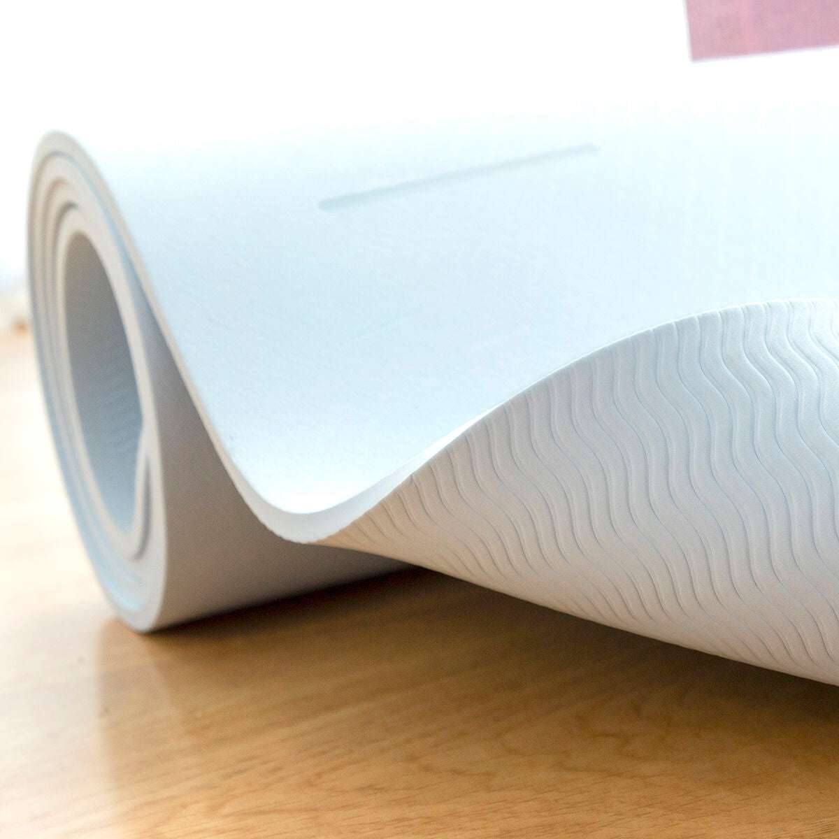 Eco-friendly TPE yoga mat with position markers
